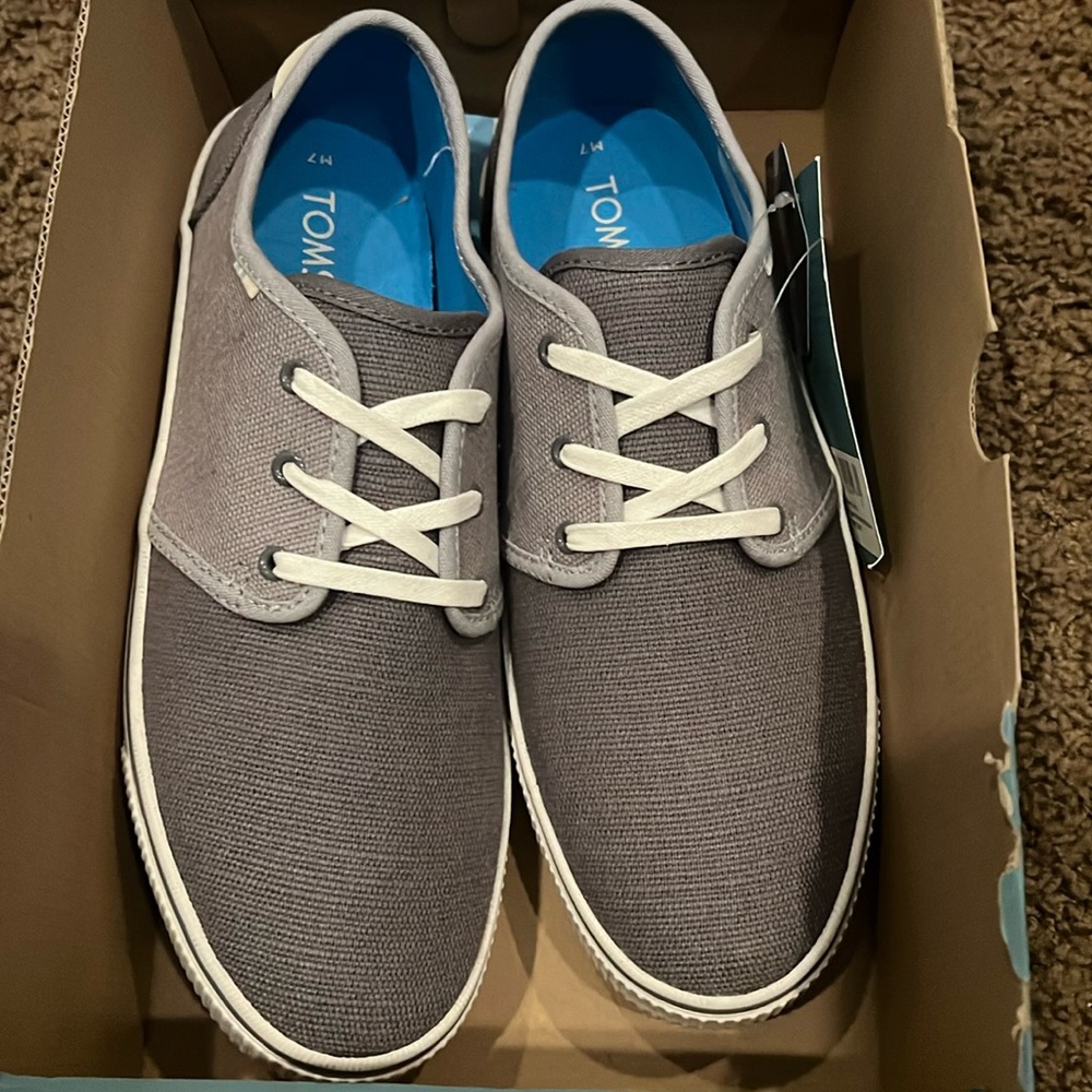 Brand new Toms men’s shoes.